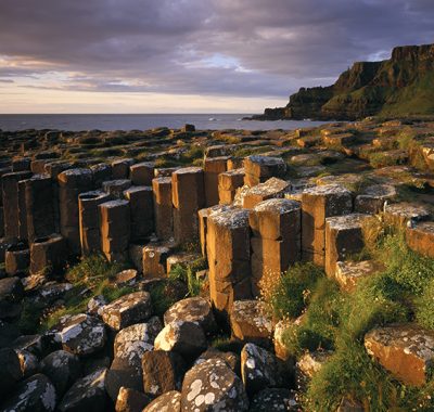 View across part of the Giant's Causeway, Co. Antrim. These basaltic columns were formed during a period of violent geological activity, The area is a World Heritage Site.